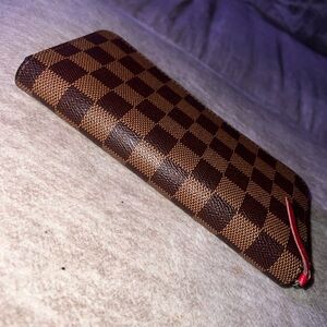 Checkered Brown Wallet with Red Zipper